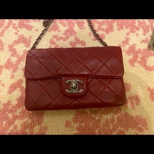Chanel Classic Flap Mini Plum Lambkin Cross Body Bag.